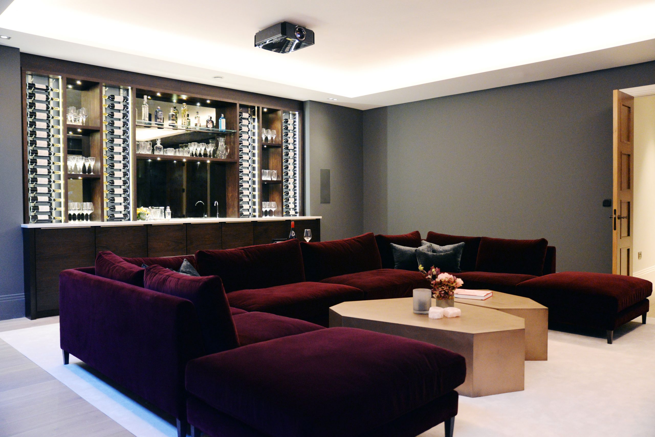 Home bar in luxury show house Montem Square media room by Origins Design bespoke furniture maker