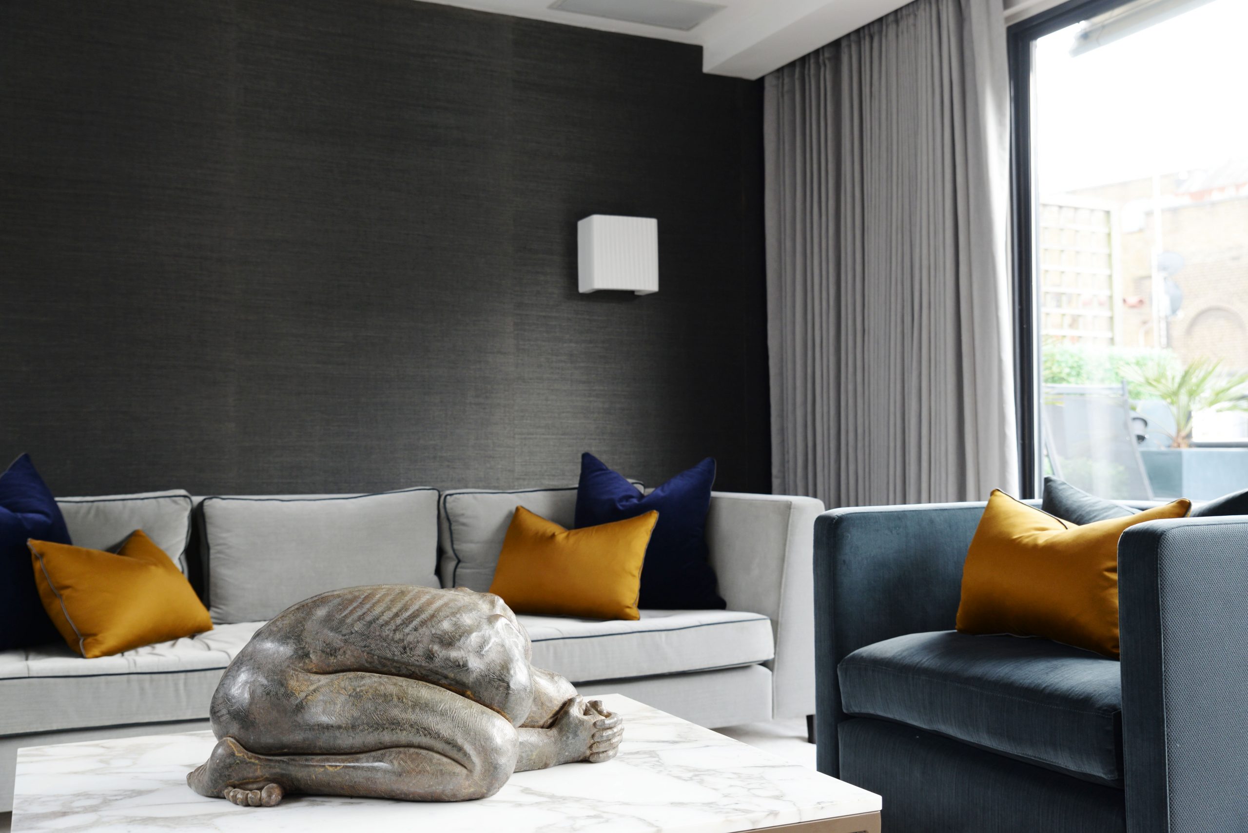 Sitting area in Kensington mews house by origins Design