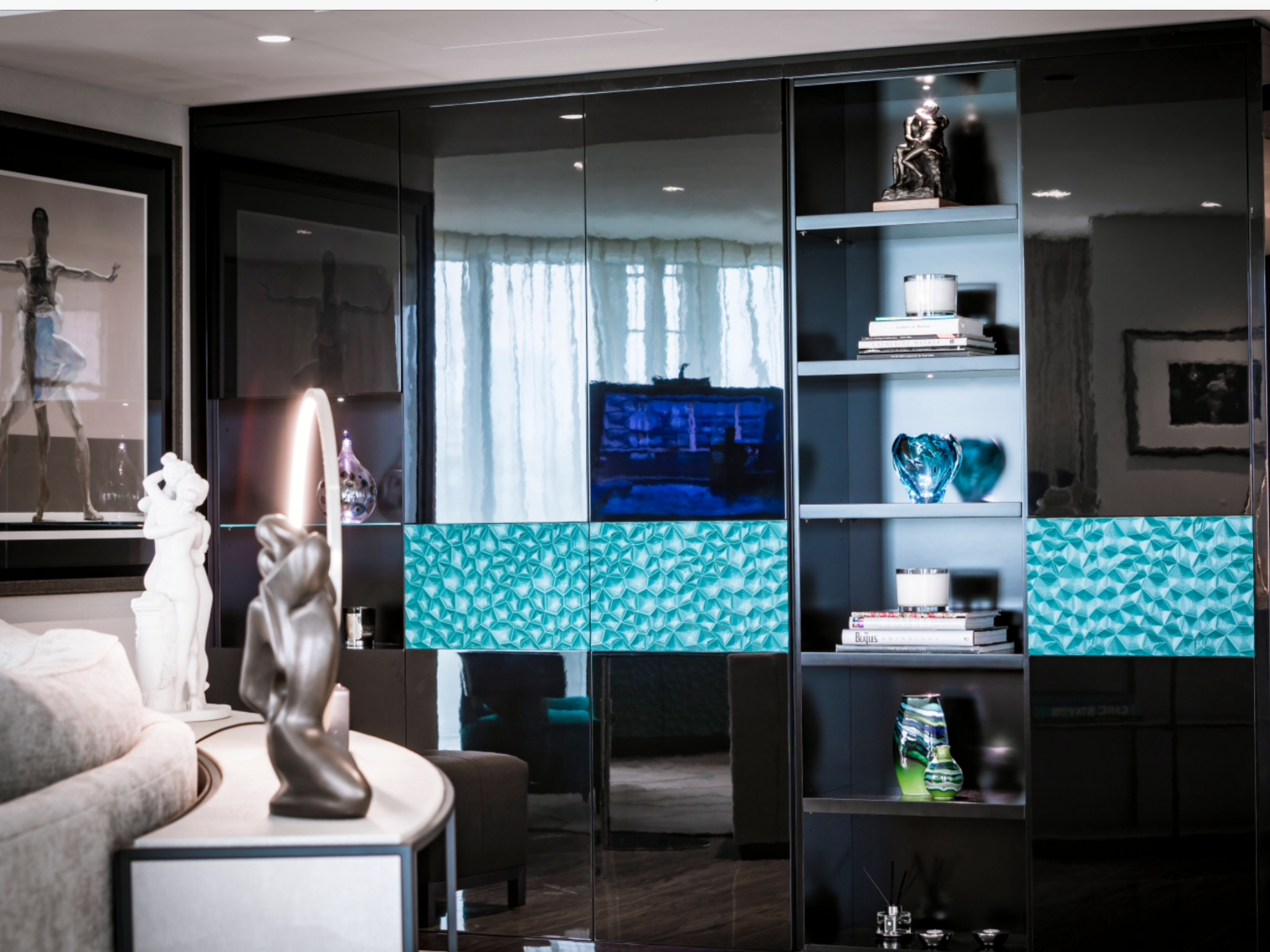 High gloss media unit and shelving One Blackfriars luxury apartment by origins Design