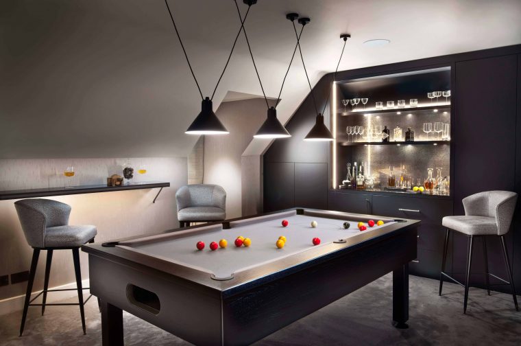8m long bespoke fitted furniture and home bar by Origins Design and refurbished Pool table