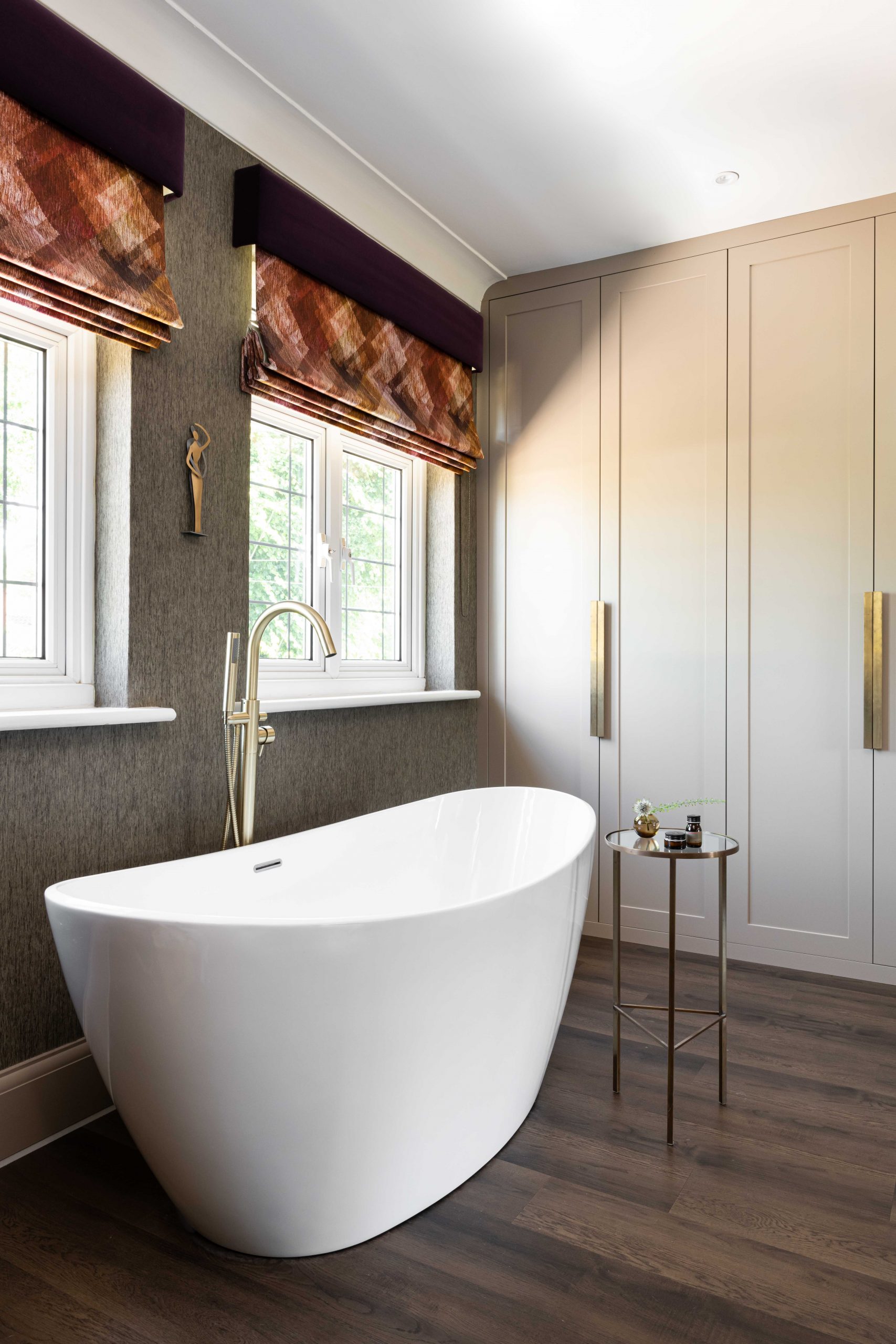 Bespoke wardrobes in master bedroom suite by Origins Design | Stylish Esher home