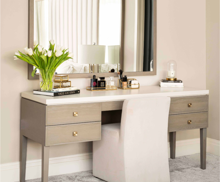 Bespoke dressing table in pale oak with two small shelves to each side and a dressing table chair in the middle. All by Origins Desigmn Esher London