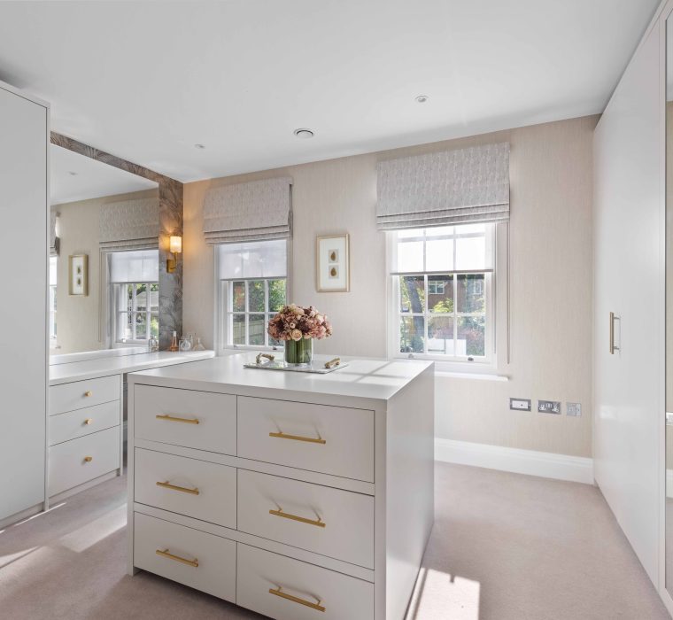 Bespoke dressing room in the master suite. West Byfleet Origins Design bespoke Furniture maker Interior designer: Octagon Interiors. Photography: Skyshot Global