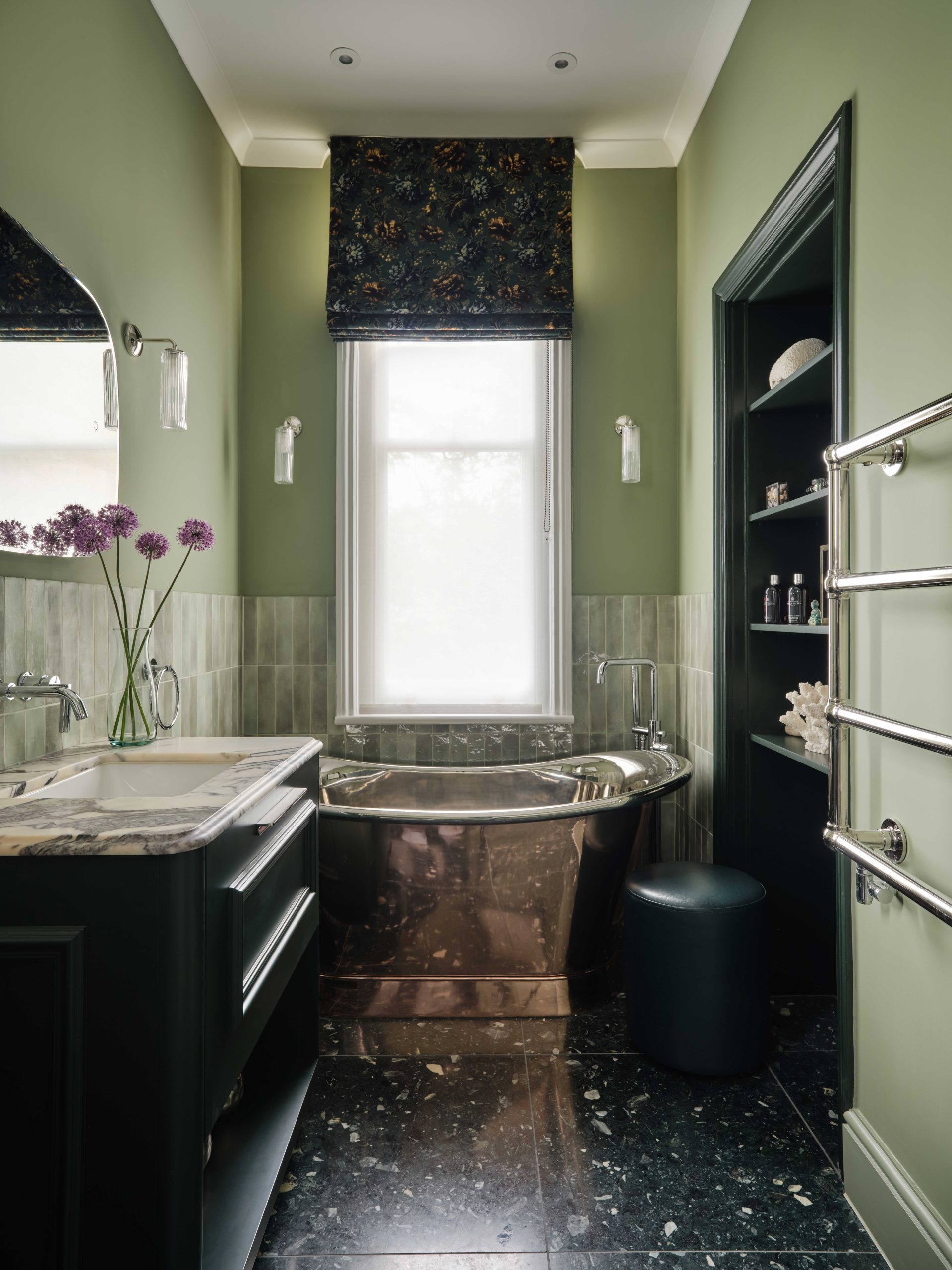 A dark green bathroom with a bespoke bathroom vanity designed and made by Origins Design