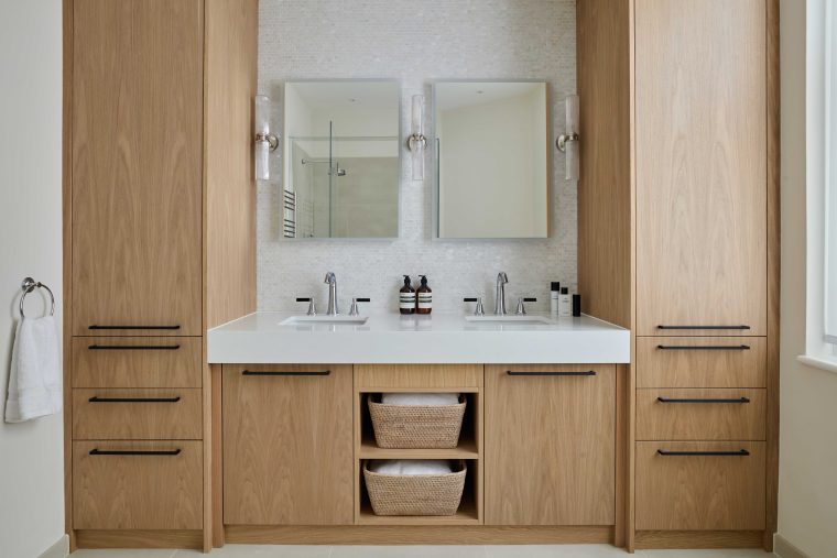 A fully fitted bespoke bathroon vanity unit with double sinks, ample storage and recessed sinks. Made by Origins Design for Interior Design Karen Oliver
