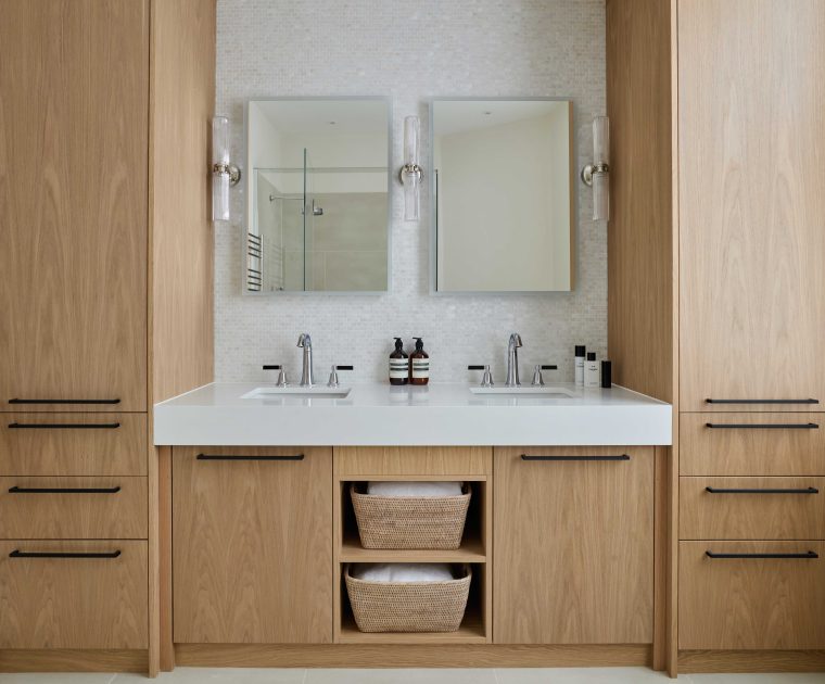 A fully fitted bespoke bathroon vanity unit with double sinks, ample storage and recessed sinks. Made by Origins Design for Interior Design Karen Oliver